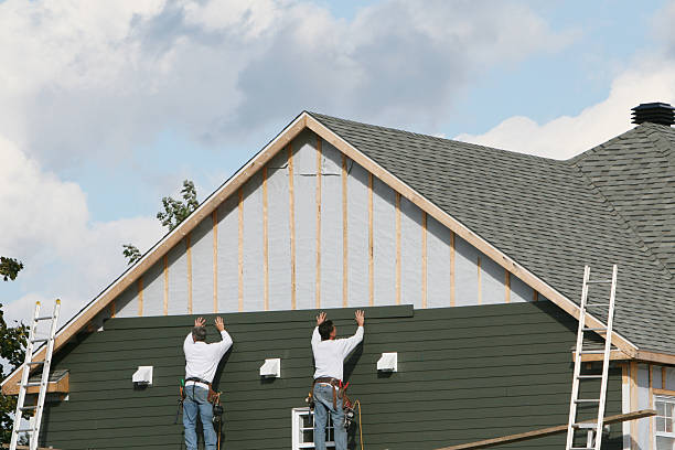 Professional Siding Installation technician working in Sparta, GA